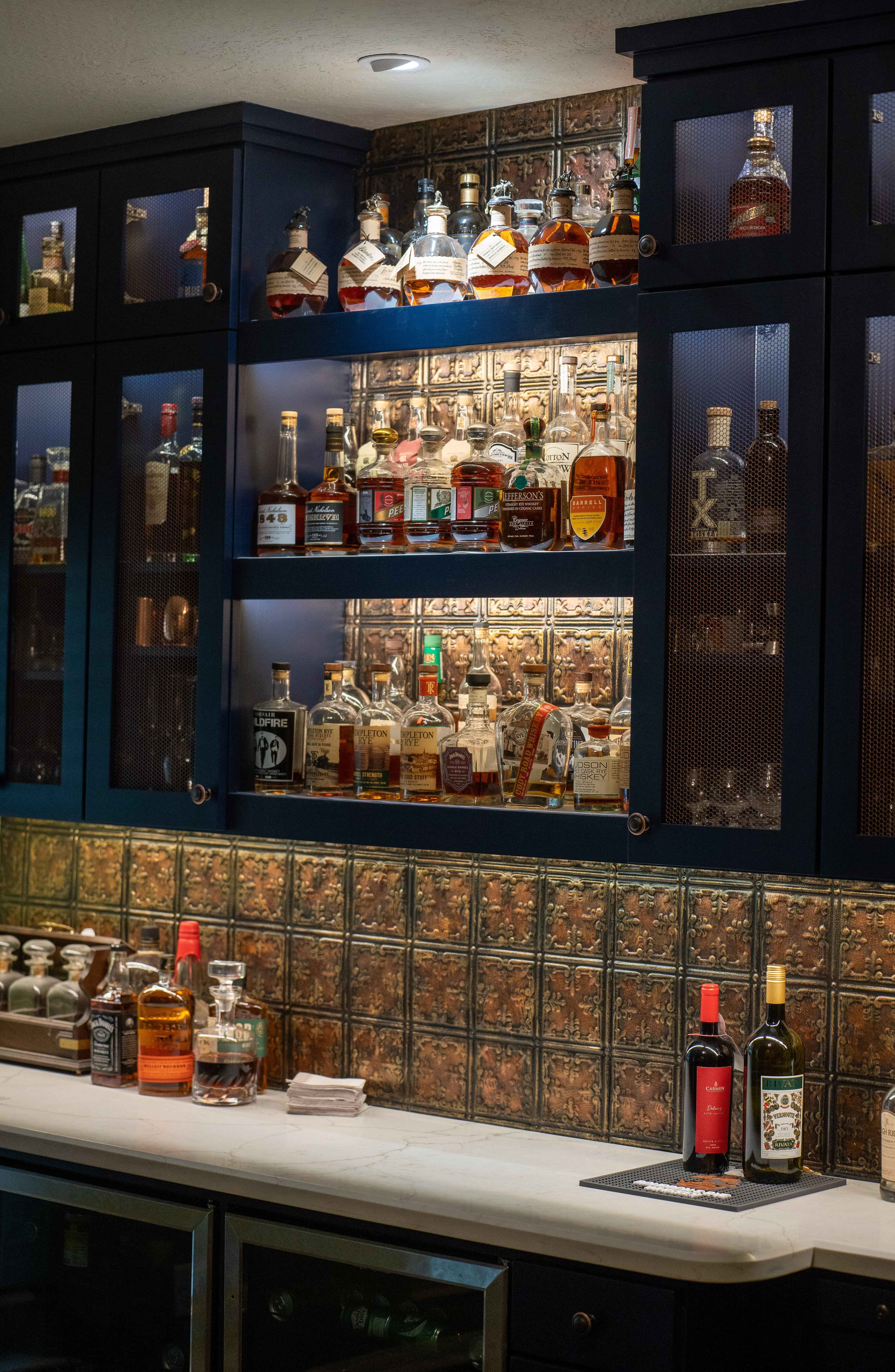 Custom home bar navy blue cabinets Houston — Matt Baker Contracting