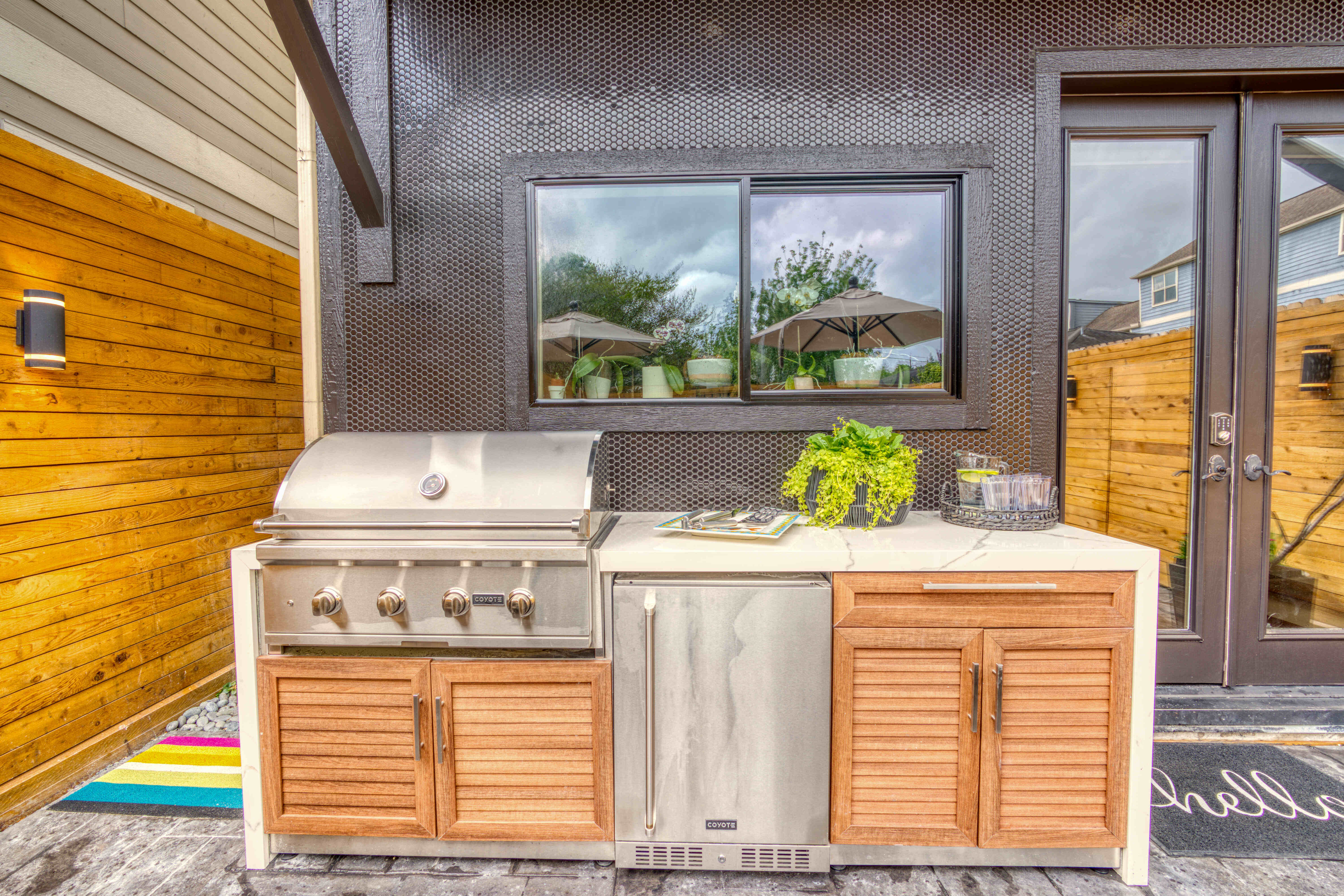 Outdoor kitchen porcelain counters Houston — Matt Baker Contracting
