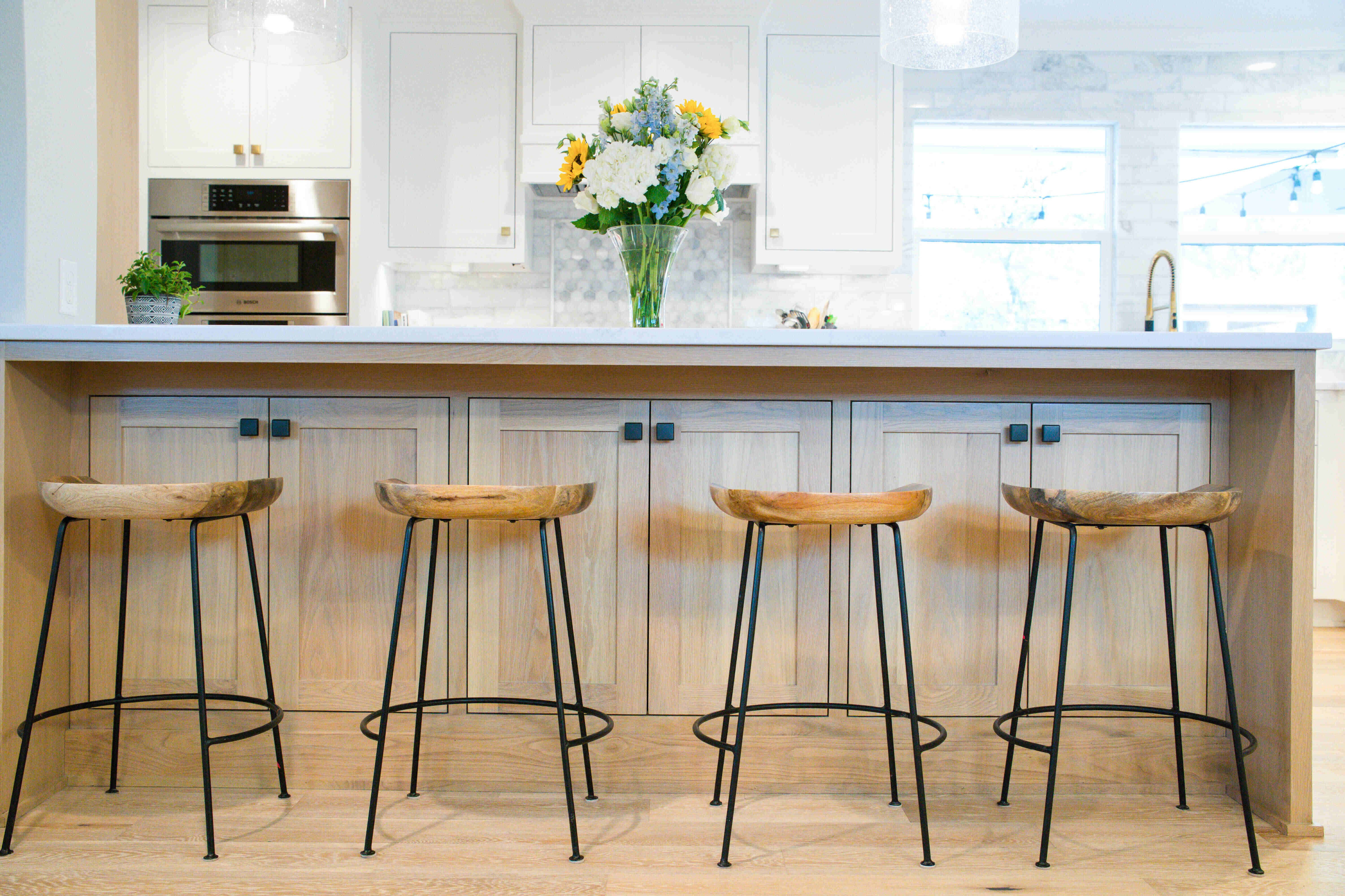 White quartz kitchen island Houston — Matt Baker Contracting